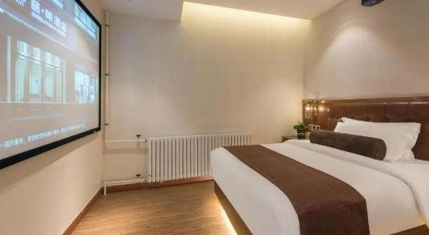 Bed in James Joyce Coffetel Shijiazhuang the Mixc Jinyuan Tower Airport Bus