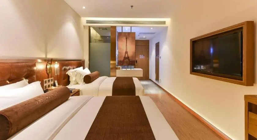 Bed in James Joyce Coffetel Shijiazhuang the Mixc Jinyuan Tower Airport Bus