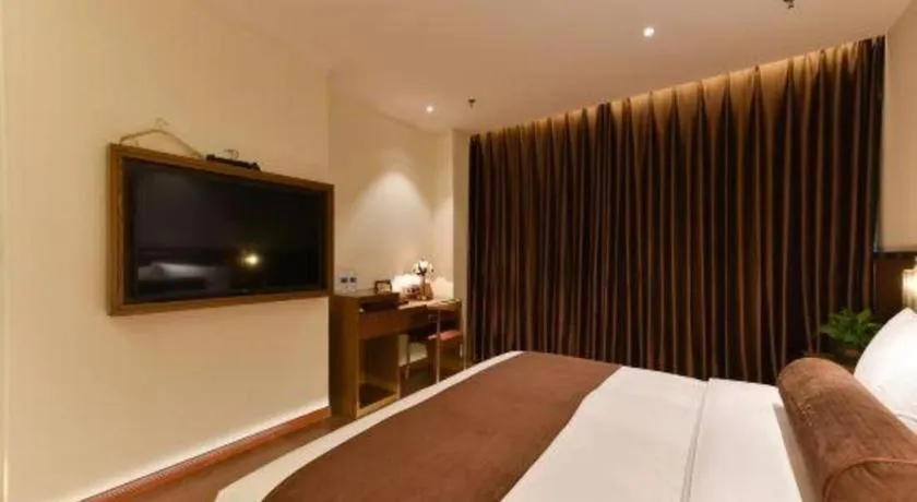 Bed in James Joyce Coffetel Shijiazhuang the Mixc Jinyuan Tower Airport Bus