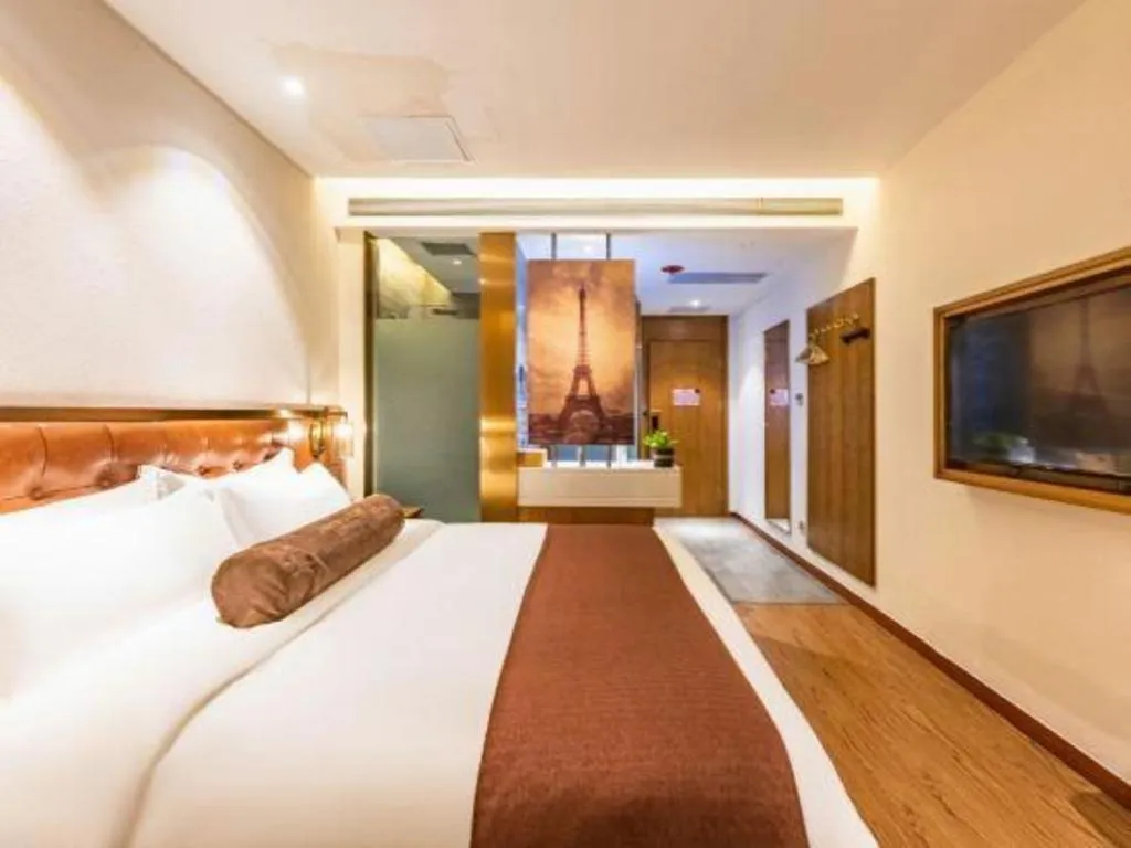 Bed in James Joyce Coffetel Shijiazhuang the Mixc Jinyuan Tower Airport Bus