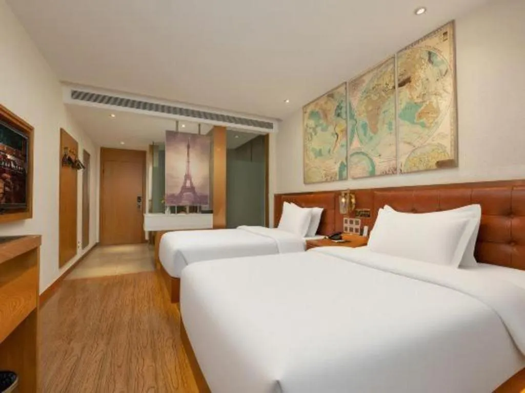 Bed in James Joyce Coffetel Shijiazhuang the Mixc Jinyuan Tower Airport Bus