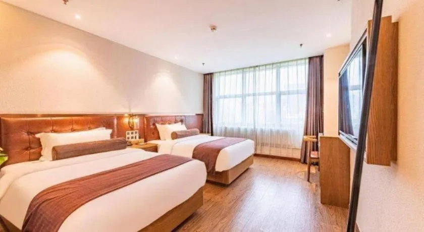 Bed in James Joyce Coffetel Shijiazhuang the Mixc Jinyuan Tower Airport Bus