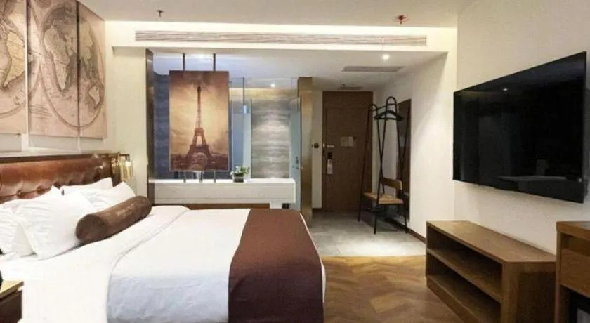 Bed in James Joyce Coffetel Shijiazhuang the Mixc Jinyuan Tower Airport Bus
