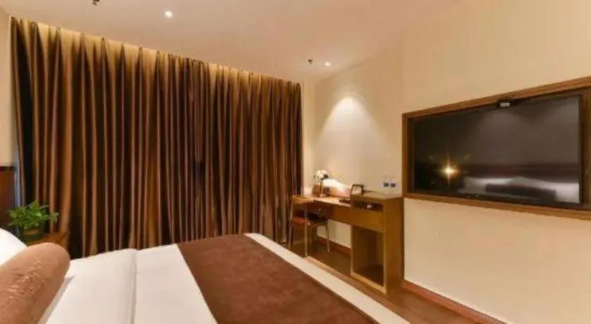 Bed in James Joyce Coffetel Shijiazhuang the Mixc Jinyuan Tower Airport Bus