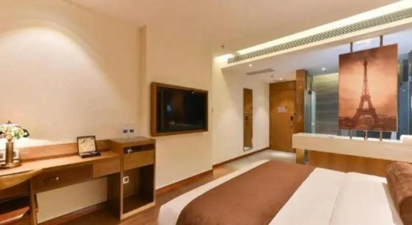 Bed in James Joyce Coffetel Shijiazhuang the Mixc Jinyuan Tower Airport Bus