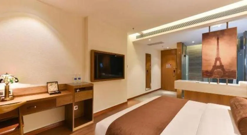 Bed in James Joyce Coffetel Shijiazhuang the Mixc Jinyuan Tower Airport Bus
