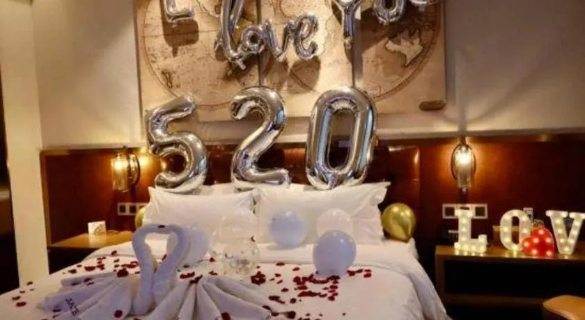 Bed in James Joyce Coffetel Shijiazhuang the Mixc Jinyuan Tower Airport Bus