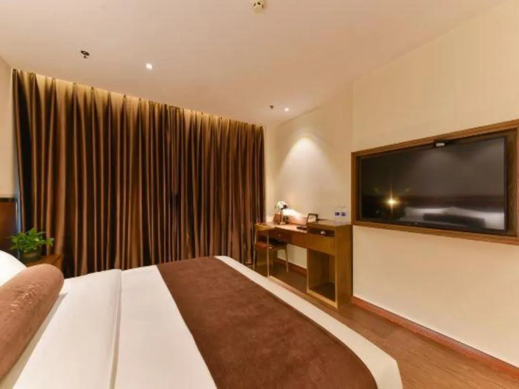 Bed in James Joyce Coffetel Shijiazhuang the Mixc Jinyuan Tower Airport Bus