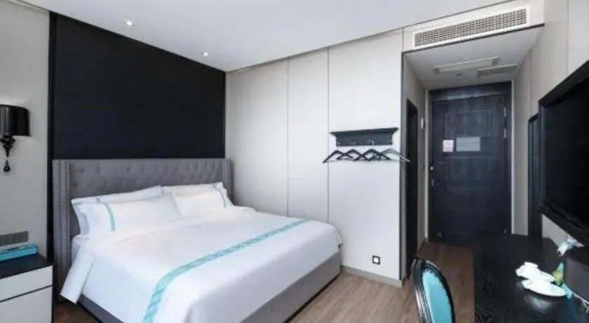 Bed in Xana Hotelle Luzhou High-Speed Railway Station Trading Market Passenger Terminal