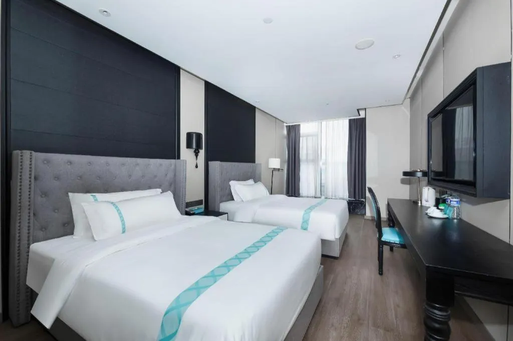 Bed in Xana Hotelle Luzhou High-Speed Railway Station Trading Market Passenger Terminal