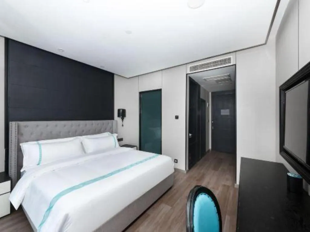 Bed in Xana Hotelle Luzhou High-Speed Railway Station Trading Market Passenger Terminal