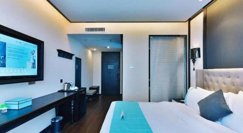 Bed in Xana Hotelle Luzhou High-Speed Railway Station Trading Market Passenger Terminal