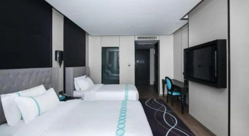 Bed in Xana Hotelle Luzhou High-Speed Railway Station Trading Market Passenger Terminal