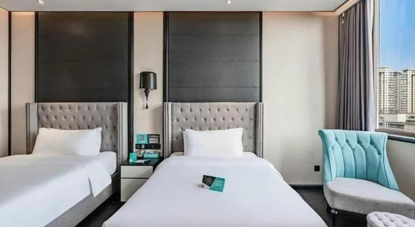 Bed in Xana Hotelle Luzhou High-Speed Railway Station Trading Market Passenger Terminal