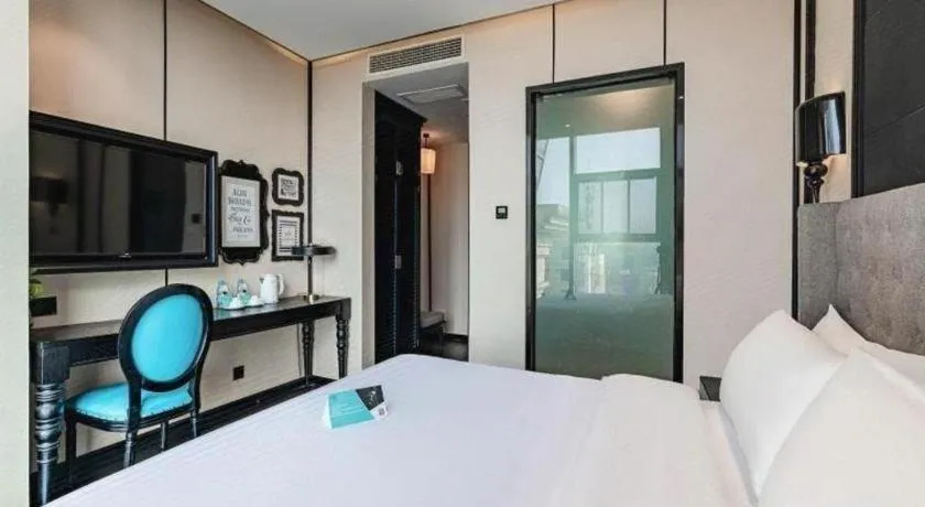 Bed in Xana Hotelle Luzhou High-Speed Railway Station Trading Market Passenger Terminal