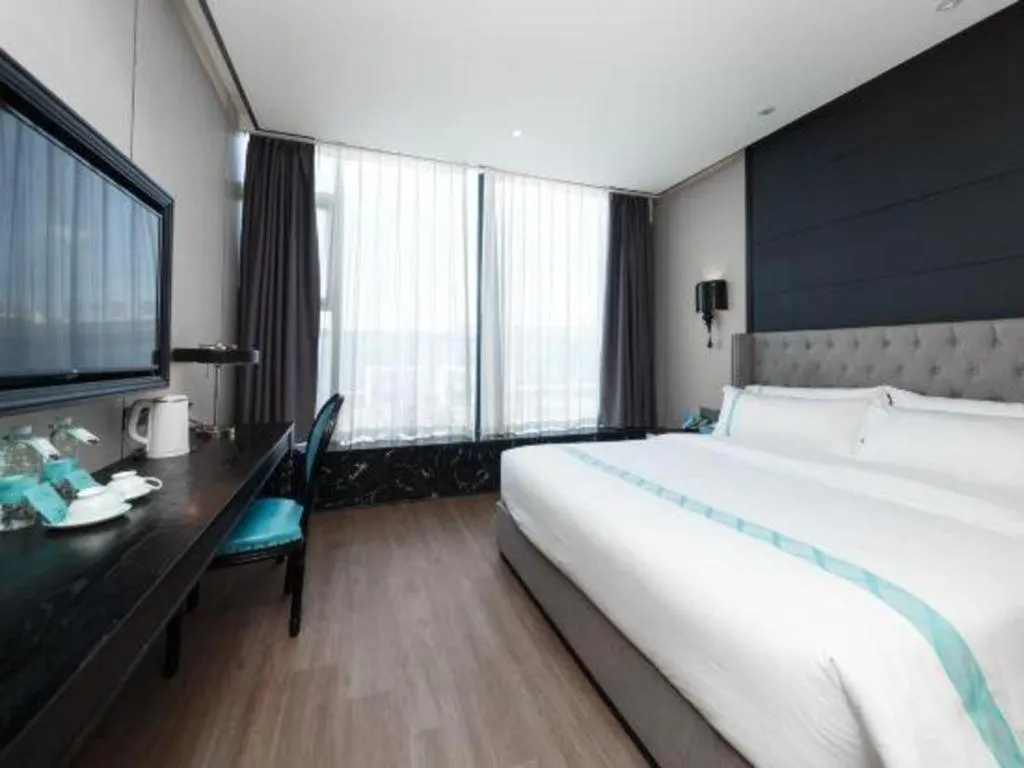 Bed in Xana Hotelle Luzhou High-Speed Railway Station Trading Market Passenger Terminal