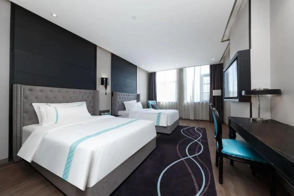 Bed in Xana Hotelle Luzhou High-Speed Railway Station Trading Market Passenger Terminal