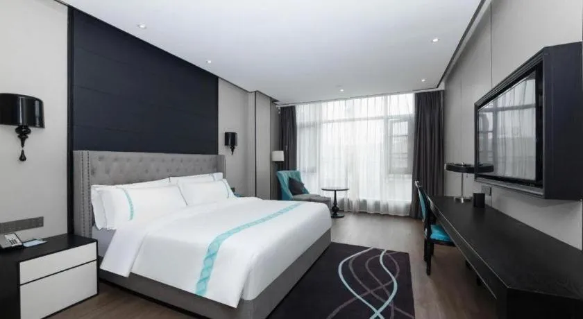 Bed in Xana Hotelle Luzhou High-Speed Railway Station Trading Market Passenger Terminal