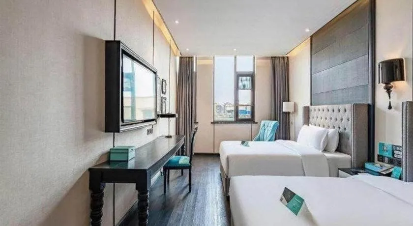 Bed in Xana Hotelle Luzhou High-Speed Railway Station Trading Market Passenger Terminal