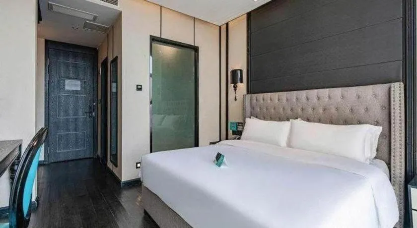 Bed in Xana Hotelle Luzhou High-Speed Railway Station Trading Market Passenger Terminal