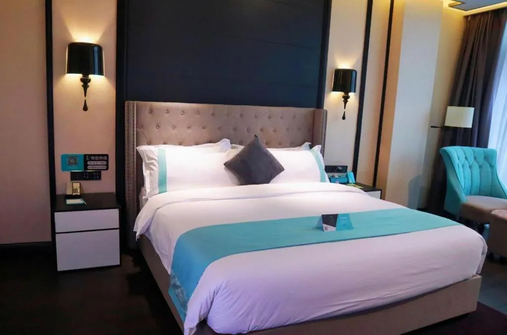 Bed in Xana Hotelle Luzhou High-Speed Railway Station Trading Market Passenger Terminal