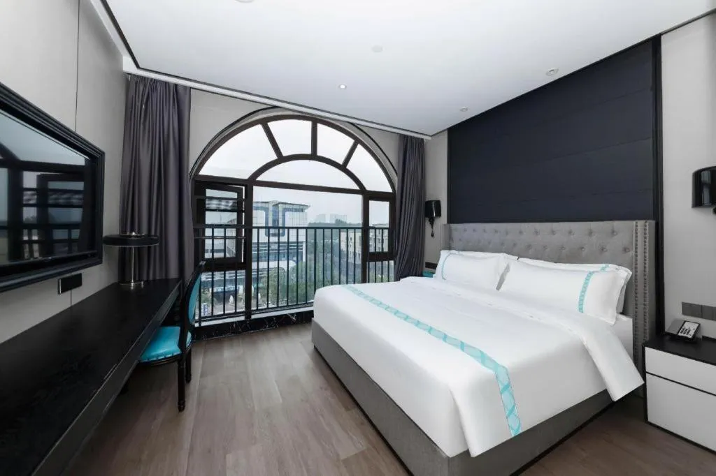 Bed in Xana Hotelle Luzhou High-Speed Railway Station Trading Market Passenger Terminal