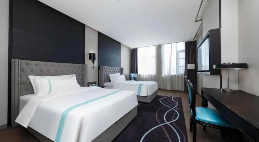 Bed in Xana Hotelle Luzhou High-Speed Railway Station Trading Market Passenger Terminal