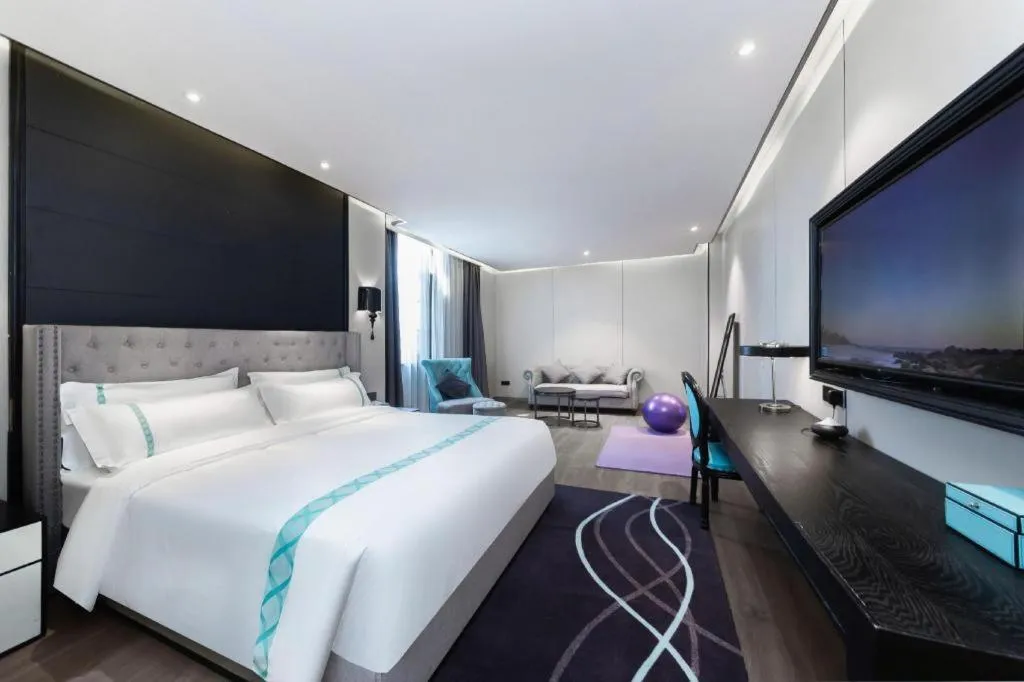 Bed in Xana Hotelle Luzhou High-Speed Railway Station Trading Market Passenger Terminal