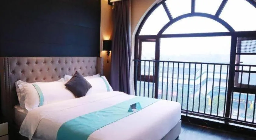 Bed in Xana Hotelle Luzhou High-Speed Railway Station Trading Market Passenger Terminal