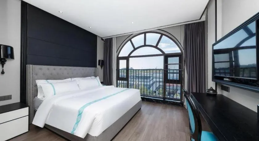 Bed in Xana Hotelle Luzhou High-Speed Railway Station Trading Market Passenger Terminal