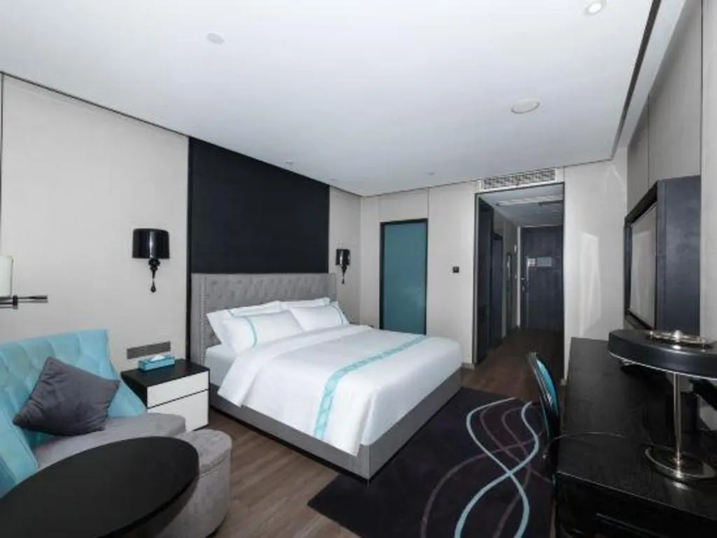 Bed in Xana Hotelle Luzhou High-Speed Railway Station Trading Market Passenger Terminal