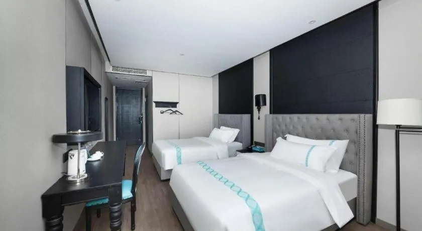 Bed in Xana Hotelle Luzhou High-Speed Railway Station Trading Market Passenger Terminal