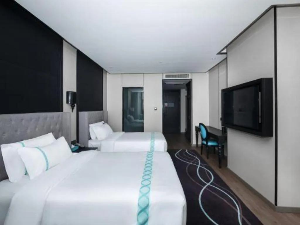 Bed in Xana Hotelle Luzhou High-Speed Railway Station Trading Market Passenger Terminal