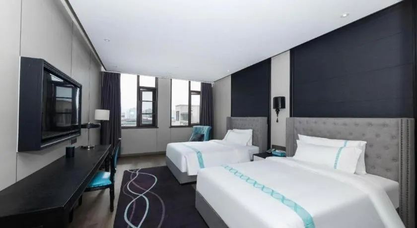 Bed in Xana Hotelle Luzhou High-Speed Railway Station Trading Market Passenger Terminal