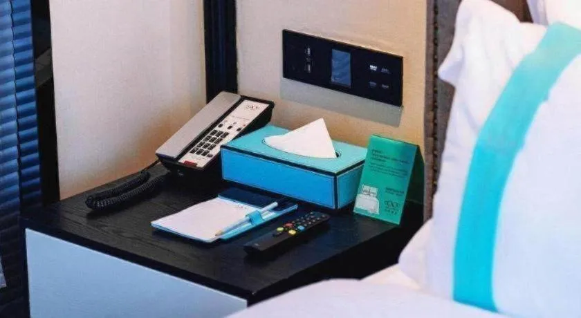 Bed in Xana Hotelle Luzhou High-Speed Railway Station Trading Market Passenger Terminal