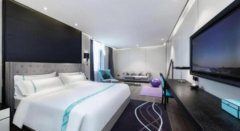 Bed in Xana Hotelle Luzhou High-Speed Railway Station Trading Market Passenger Terminal