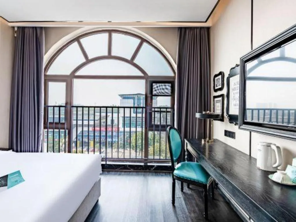 Bed in Xana Hotelle Luzhou High-Speed Railway Station Trading Market Passenger Terminal