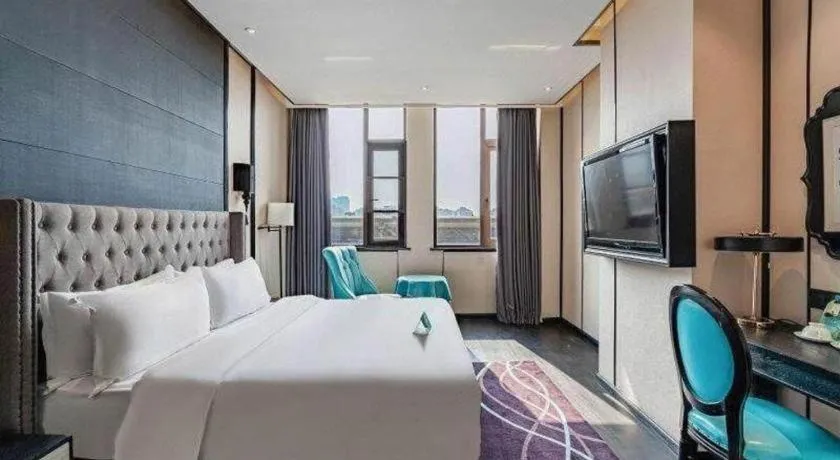 Bed in Xana Hotelle Luzhou High-Speed Railway Station Trading Market Passenger Terminal