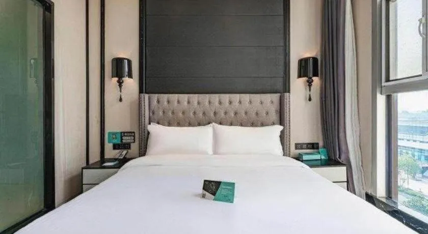 Bed in Xana Hotelle Luzhou High-Speed Railway Station Trading Market Passenger Terminal