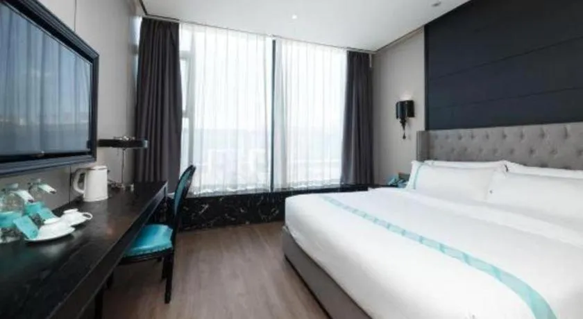 Bed in Xana Hotelle Luzhou High-Speed Railway Station Trading Market Passenger Terminal