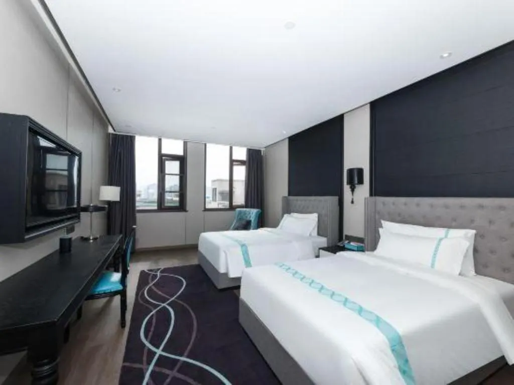 Bed in Xana Hotelle Luzhou High-Speed Railway Station Trading Market Passenger Terminal