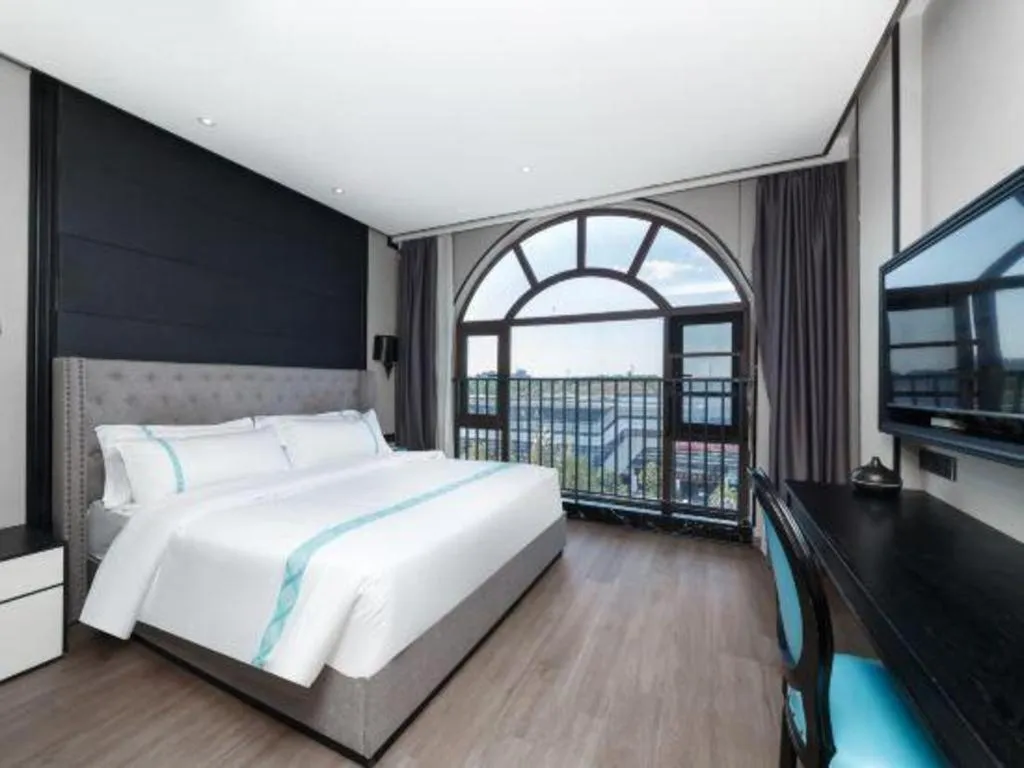 Bed in Xana Hotelle Luzhou High-Speed Railway Station Trading Market Passenger Terminal