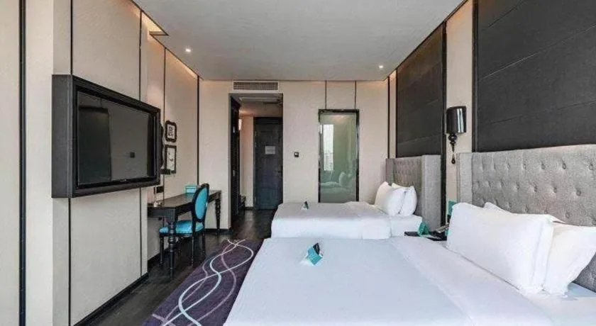 Bed in Xana Hotelle Luzhou High-Speed Railway Station Trading Market Passenger Terminal