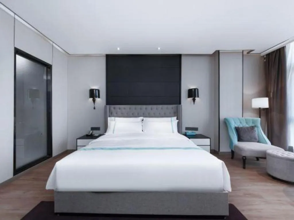 Bed in Xana Hotelle Luzhou High-Speed Railway Station Trading Market Passenger Terminal