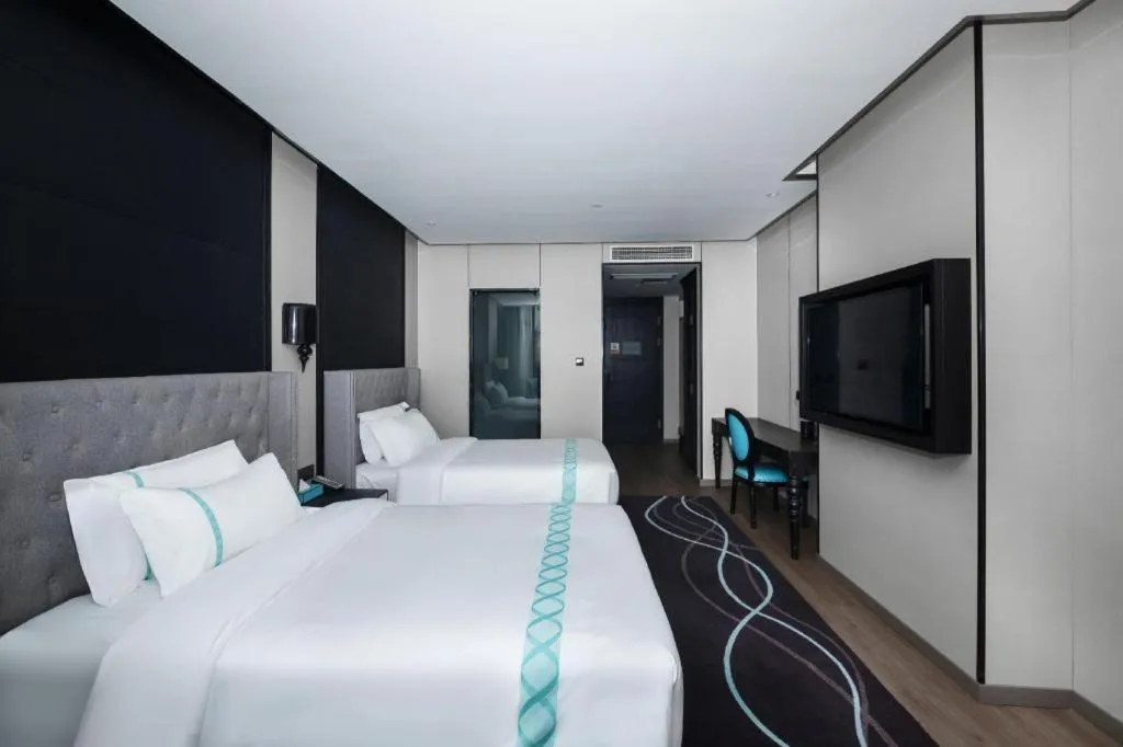 Bed in Xana Hotelle Luzhou High-Speed Railway Station Trading Market Passenger Terminal