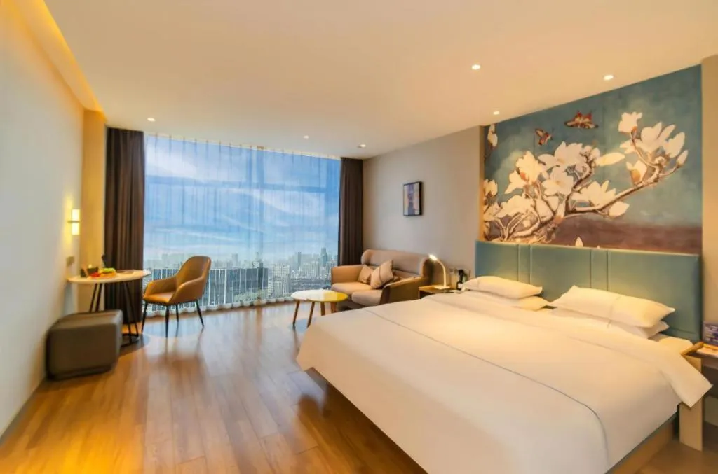 Bed in Magnotel Tongxiang Shimao Center