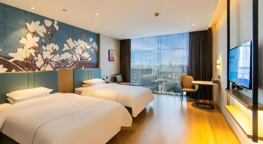 Bed in Magnotel Tongxiang Shimao Center