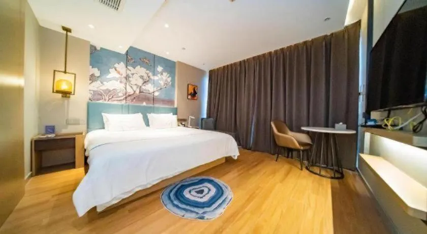 Bed in Magnotel Tongxiang Shimao Center