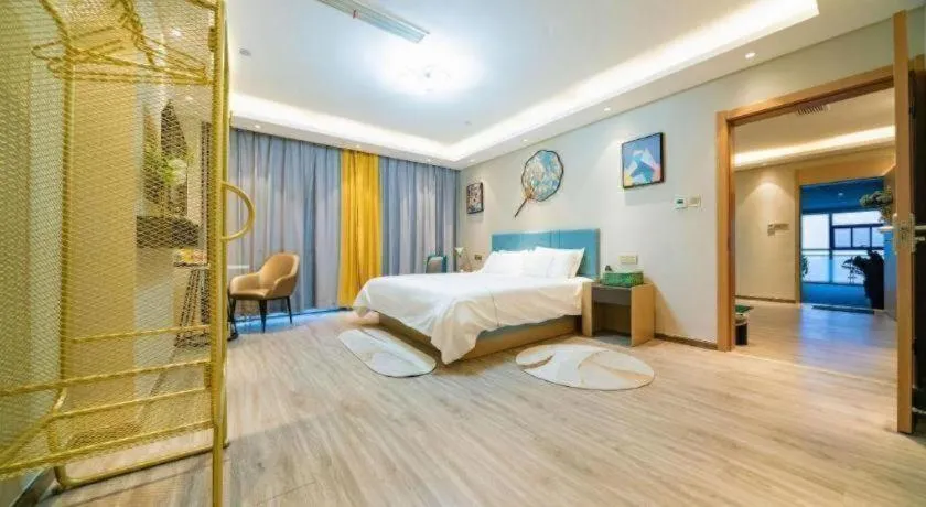 Bed in Magnotel Tongxiang Shimao Center