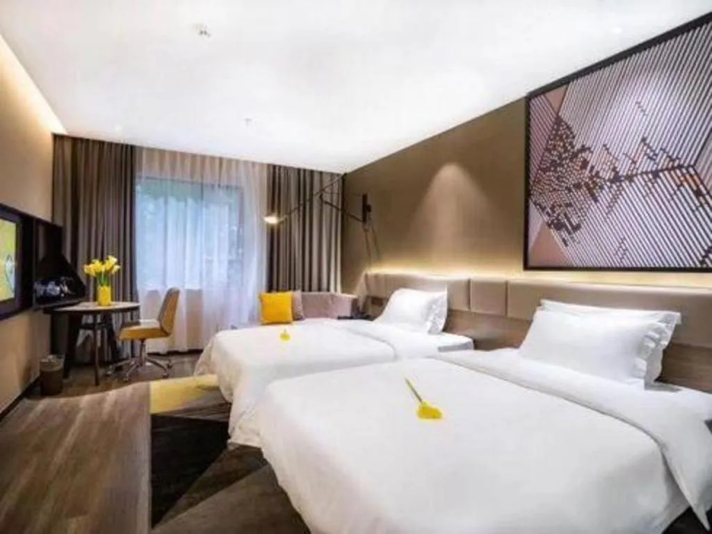 Bed in IU Hotels· Wuhan Jianghan Road Metro Station